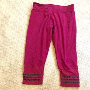 Women’s medium magenta Adidas leggings.